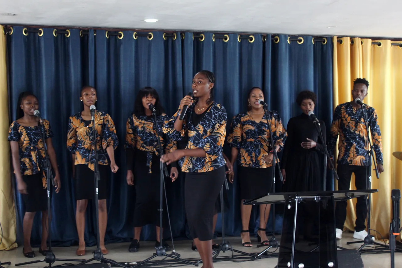 The choir in matching chitenge shirts